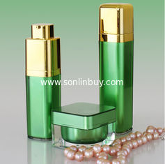 China Golden Pump Acrylic Lotion Bottles Jars, Green Square Acrylic Cosmetic Package Bottle Jars supplier