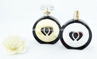 China Round black margin double heart decoration High Quality 100ml Glass Perfume Bottles supplier