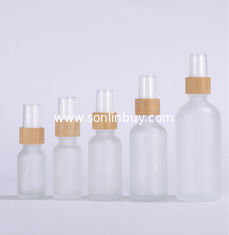 China Bamboo Spray Bottle of 5ml 10ml 15ml 20ml 30ml 50ml 100ml Grosted Glass Essential oil bottle bamboo package supplier