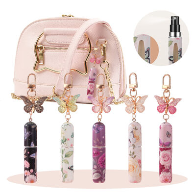 quality  New Popular 5ml Fragrance Bottles Fine Mist Spray Cosmetic Perfume Samples Aromatherapy Bottles Portable Perfume Bottles Travel Perfume Vials with butterfly-shaped keychain cute girly perfume bottles factory