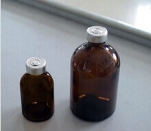 Amber moulded injection vial with aluminum cap