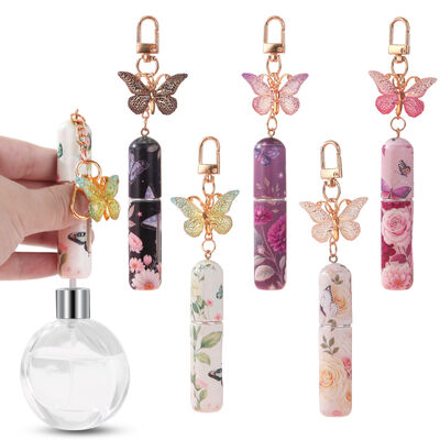 New Popular 5ml Fragrance Bottles Fine Mist Spray Cosmetic Perfume Samples Aromatherapy Bottles Portable Perfume Bottles Travel Perfume Vials with butterfly-shaped keychain cute girly perfume bottles